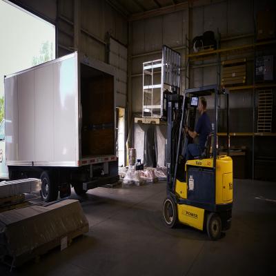 Fork-tip camera for high-rack pallet entry